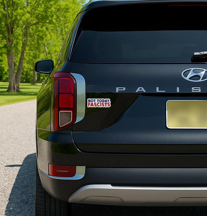 'Not Today Fascists' magnet or vinyl decal displayed on the back of a black SUV. A bold, high-quality political sticker perfect for cars, laptops, fridges, or toolboxes. Great for activists, protestors, or anyone fed up with fascism.
