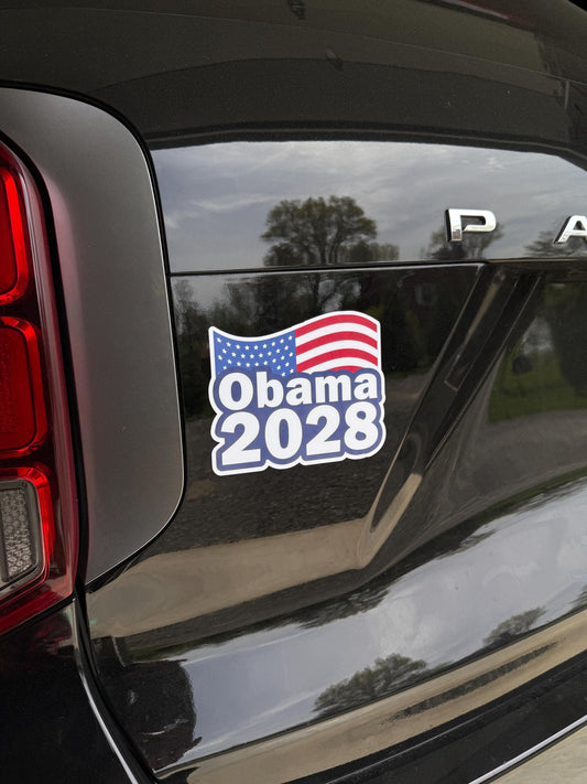 A bold magnet or vinyl decal that says "OBAMA 2028" with an American flag background, perfect for cars, laptops, and more.