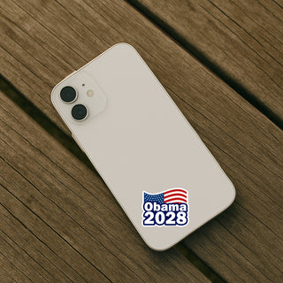 Phone with Obama 2028 sticker on a wooden surface