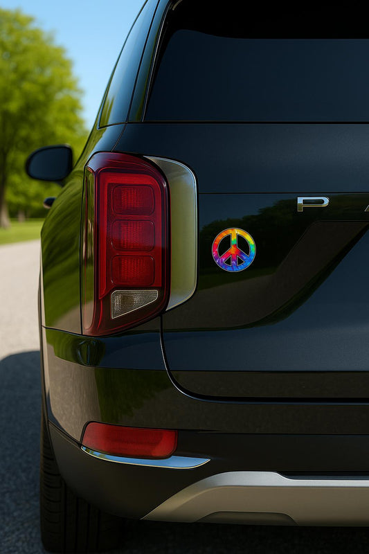 Tie-dye rainbow peace sign in bold colors with black outline, symbolizing love, unity, and protest.
