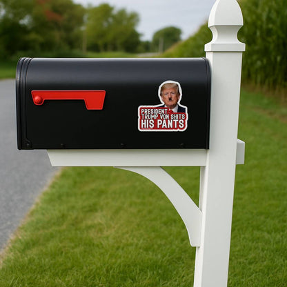 Black rural mailbox displaying President Trump Von Shits His Pants anti Trump protest vinyl decal on the side panel