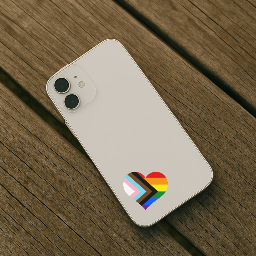Phone case with a rainbow heart design on a wooden surface