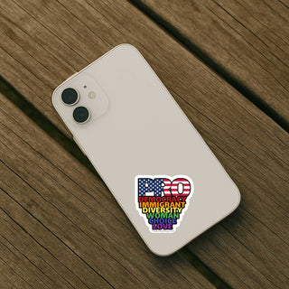 Phone with a colorful sticker on a wooden surface