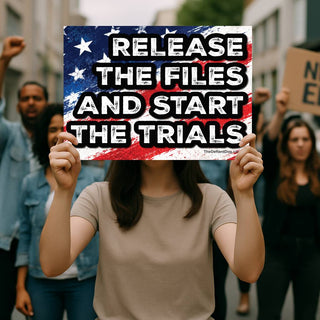 Release the Files and Start the Trials political protest sign being held at a demonstration. Distressed American flag background with bold white lettering calling for the release of Epstein files, government transparency, justice, and accountability.