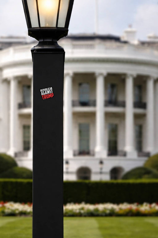 Republican Against Trump Anti Trump political vinyl decal on black lamp post near White House conservative protest sticker