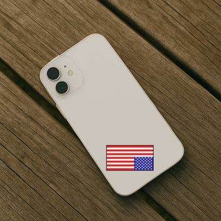 Phone case with American flag design on a wooden surface