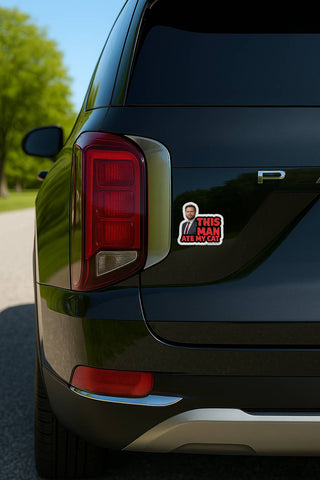 Car with a 'This Man at my cat' with JD Vance's face sticker on the back