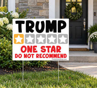 Trump One Star Do Not Recommend anti-MAGA yard sign in a residential front lawn near a house entrance, featuring sarcastic political humor and a one-star rating.