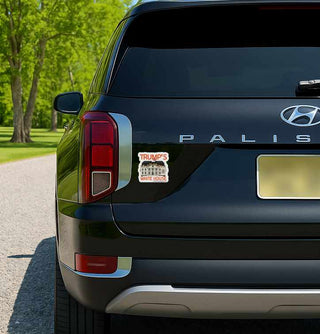 Back of a black Hyundai Palisade with a sticker on the trunk