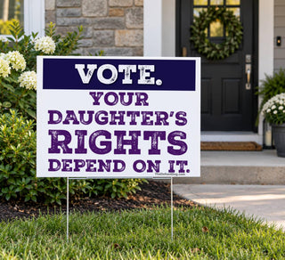Vote Your Daughter’s Rights Depend On It women’s rights yard sign displayed on a metal H-stake in a front lawn.