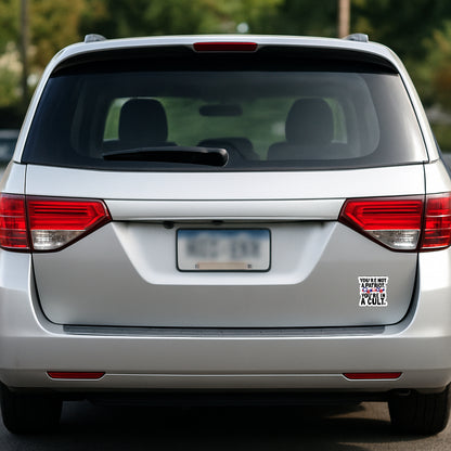 'You're Not a Patriot  You're in a Cult' magnet or vinyl decal displayed on the back of a silver minivan. A bold, high-quality political sticker perfect for cars, laptops, fridges, or toolboxes. Great for activists, protestors, or anyone fed up with fascism.